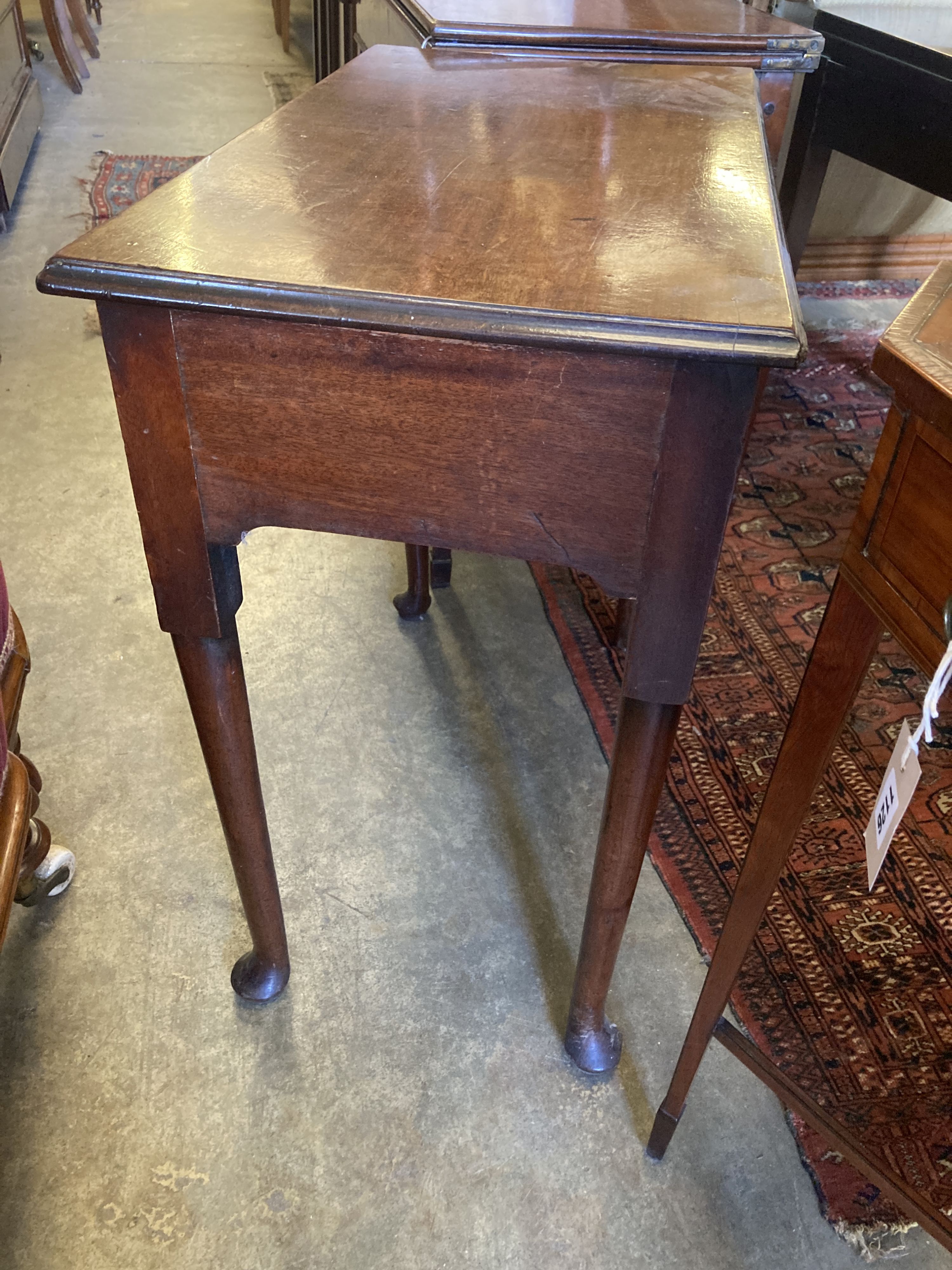 A George II mahogany side table fitted drawer on plain turned legs and pad feet, width 70cm, depth 39cm, height 71cm